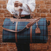 This is an image of a garment duffle bag